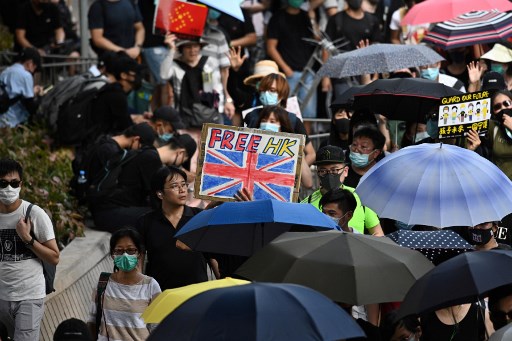 Protesters attend a pro-democracy march in Hong Kong on September 15, 2019. – Millions of people have taken part in demonstrations over the last three months which have morphed into calls for democracy and complaints against the erosion of freedoms under Beijing’s rule. (Photo by Anthony WALLACE / AFP)
