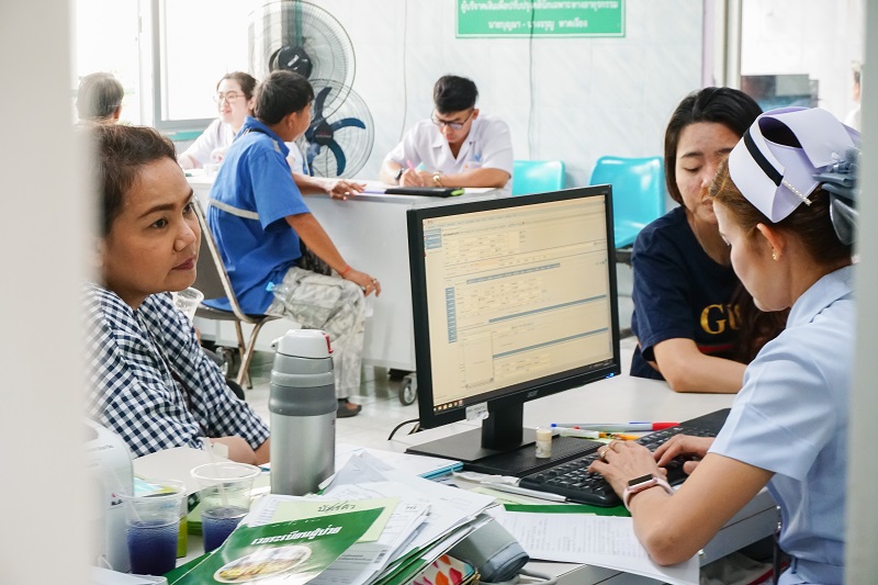 Medical staff provide service to patients inside the medical marijuana clinic. Photo: Coconuts Bangkok
