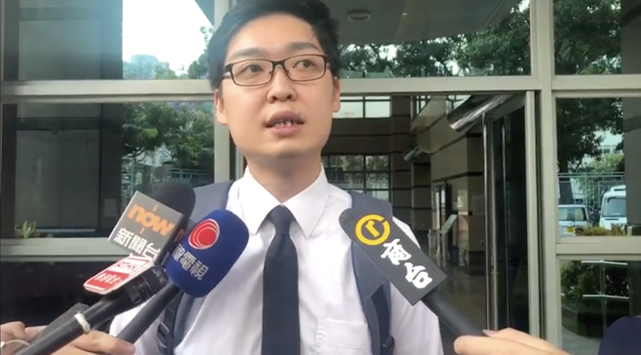 Andy Chan speaking to reporters outside Fanling magistrates’ Court. Screengrab via Facebook video/Stand News.