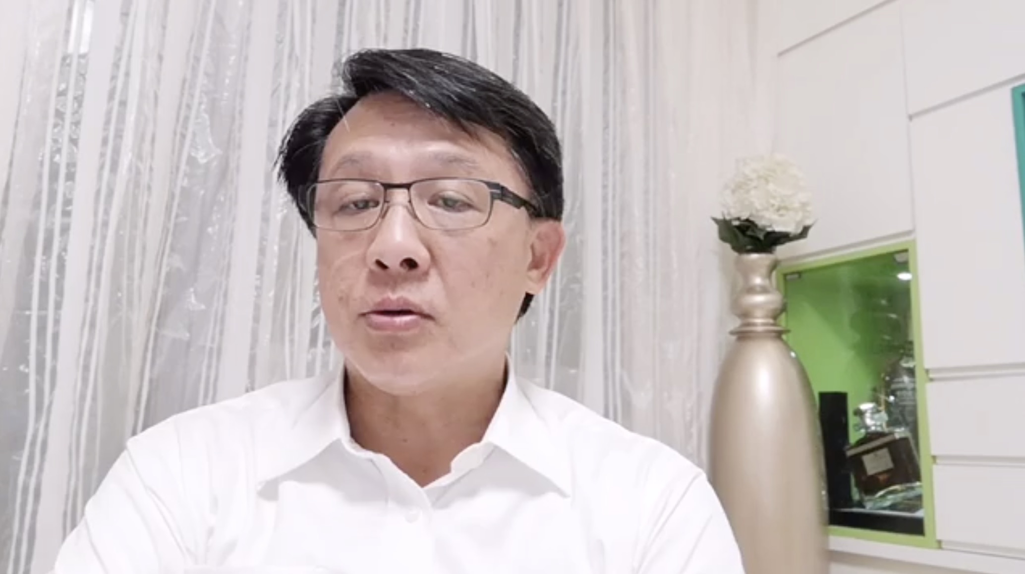 Pro-Beijing lawmaker Junius Ho announcing details of a clean up day taking place this Saturday. Screengrab via Facebook video.