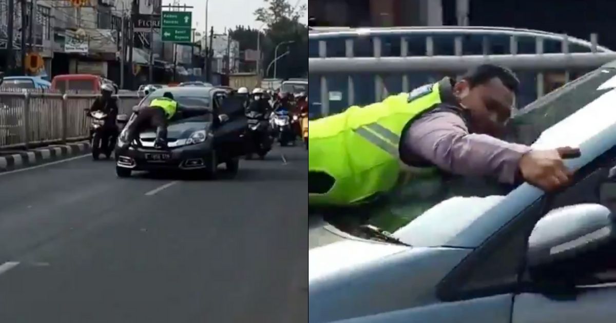 A video of a police officer who jumped onto the hood of a moving car in order to stop it for a traffic violation in Pasar Minggu, South Jakarta has recently gone viral. Screenshot from Twitter