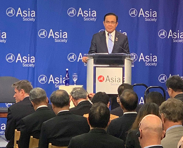 Prayuth reacts to a protester during his Wednesday speech at the Asia Society.