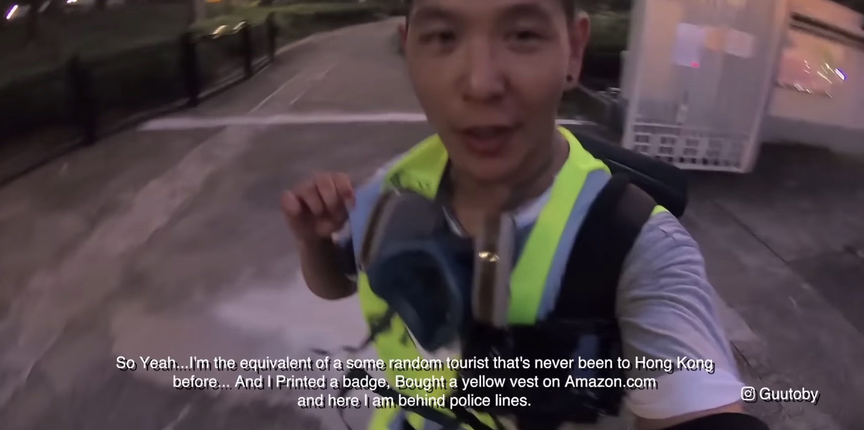Toby Gu, a Canadian influencer faced backlash online after he posted a video of himself posing as a journalist to film a protest in Sha Tin in Hong Kong. Screengrab via YouTube.