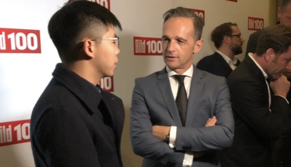 Hong Kong pro-democracy activist Joshua Wong and German Foreign Minister Heiko Maas speak at an event held by the German newspaper Bild on Monday. Photo via Facebook.