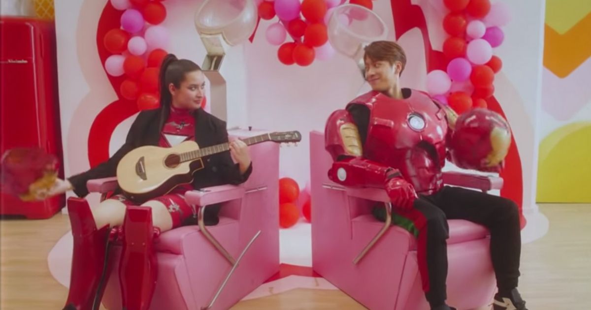 Stephanie Poetri and Jackson Wang don the Iron Man costume in the music video for ‘I Love You 3000 II’. Screenshot from Youtube/88rising