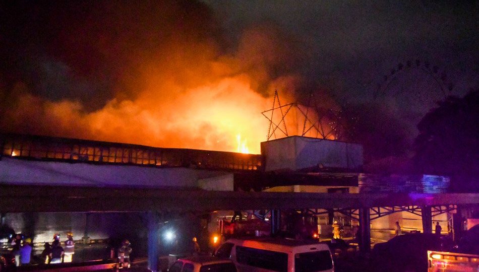 A fire rages at the Star City theme park early Wednesday morning in Pasay City. Photo: Mark Demayo/ABS-CBN News