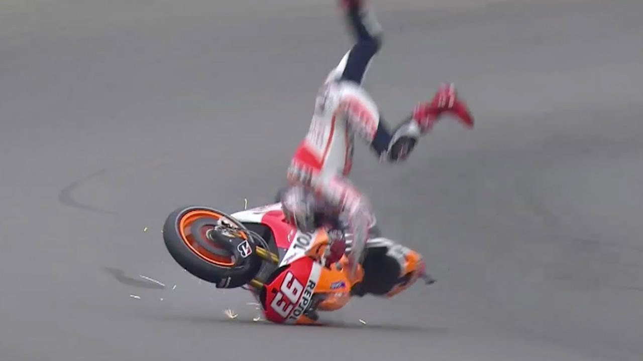Spanish MotoGP racer Marc Marquez crashes Friday in Buriram during the first practice lap after rain stopped falling. Image: MotoGP / YouTube