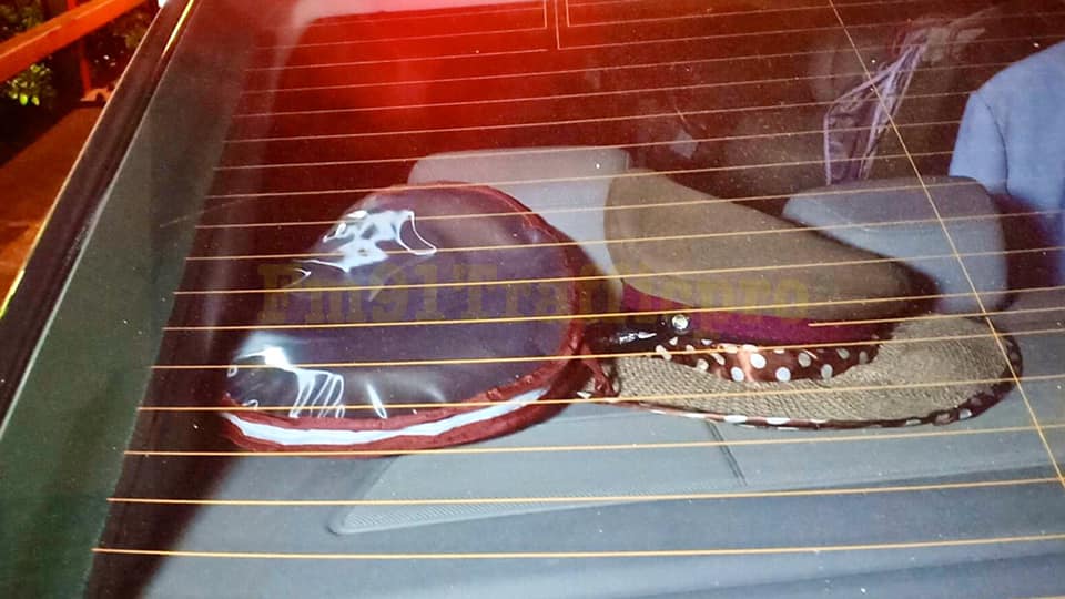 Police hat and badge found in car left at the scene – police were still unconvinced. Photo: FM91