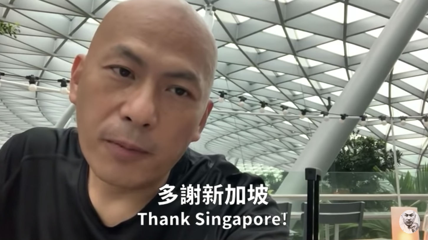 Alex Yeung speaking from the Changi Airport prior to his flight. (Photo: Alex Yeung/YouTube)