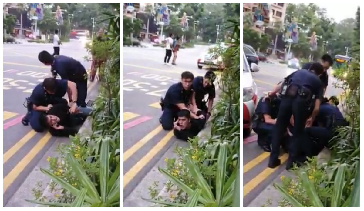Police officers pin down Singaporean actor-singer Aliff Aziz Sunday morning on Orchard Road. Photos: Oh Media/Facebook