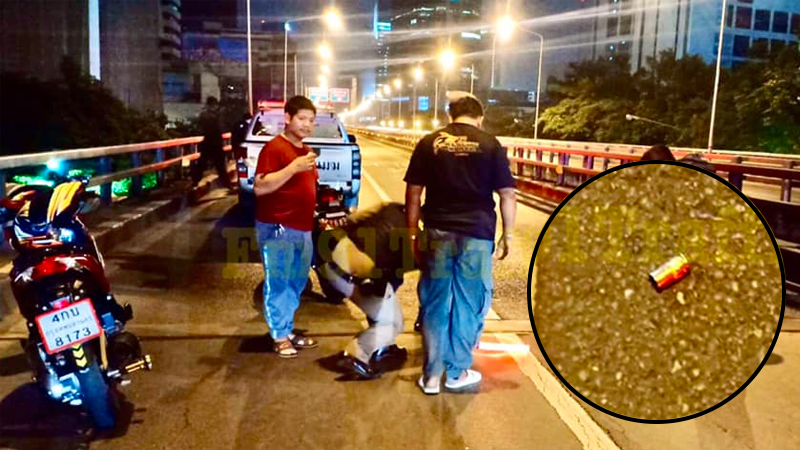 The scene of an accident on the flyover above Rama IV Road where the strange incident went down. Inset, a bullet casing witnesses say was fired from a cop’s gun. Photo: FM91
