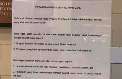 A sign put up by a Tous les Jours store in Jakarta saying that the store refuses to print messages on cakes that violate Islamic sharia laws and values. Photo: Twitter