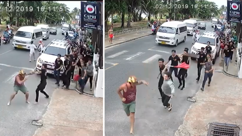 An American man flees from employees of a Phuket restaurant Monday in still taken from a video. Images: Phuket Hotnews / Facebook