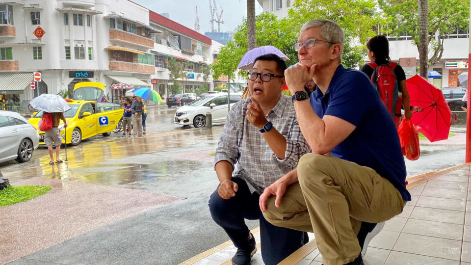 Singapore architecture photographer Darren Soh with Apple CEO Tim Cook in Tiong Bahru. Photo: Darren Soh/Facebook