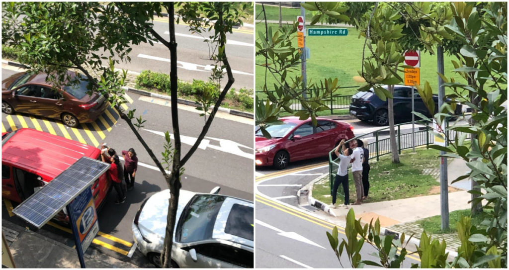 Pedestrians in Little India stop to gaze at the eclipse. Photo: Coconuts Singapore