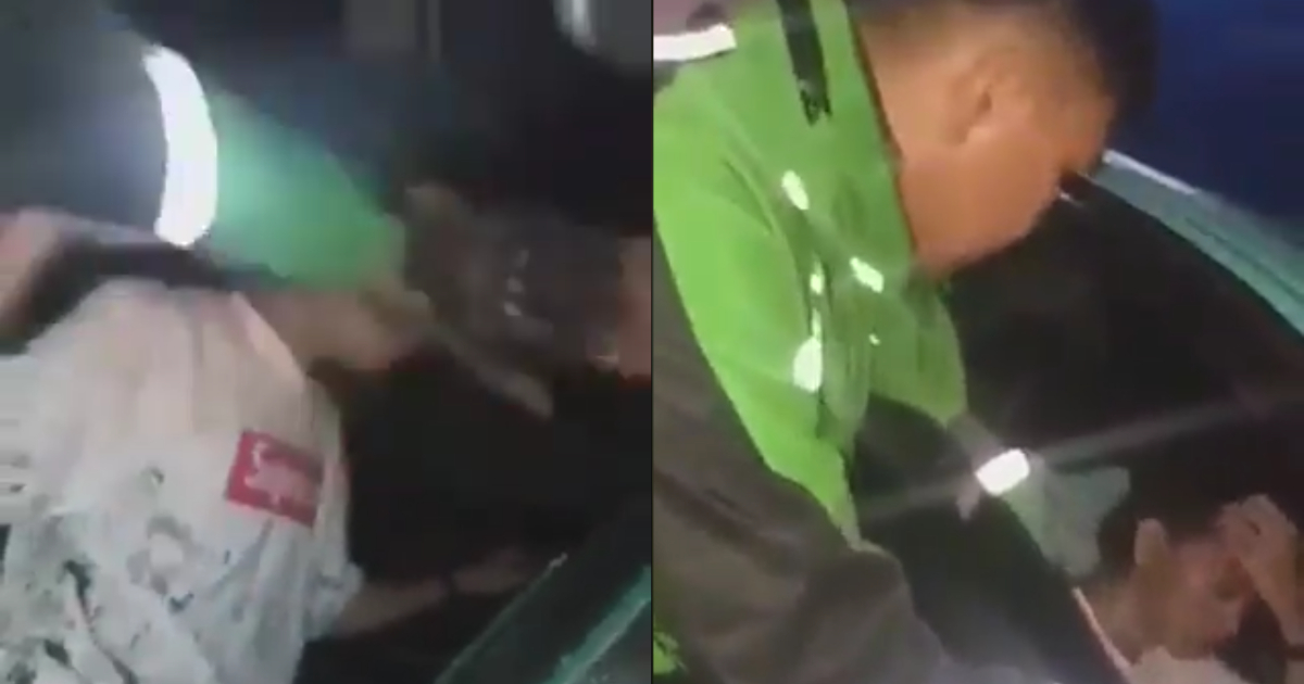 An ojol driver in Manado was caught on camera physically assaulting a customer, allegedly for being so outraged by the latter for canceling on him. Screenshot from Facebook/Hamiem Alambara