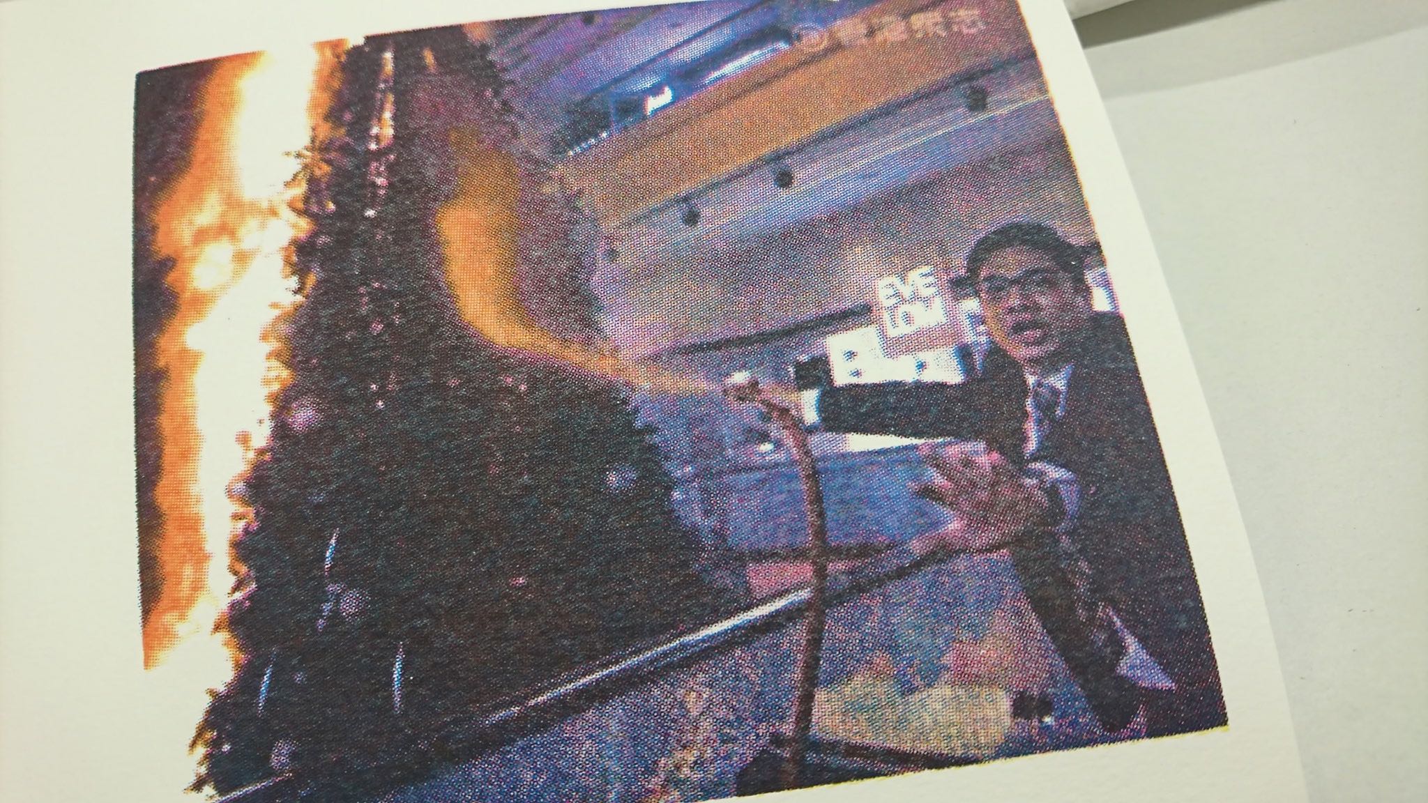 A limited edition Christmas card depicting a mall employee trying to extinguish a flaming Christmas tree last month. Photo via Facebook.