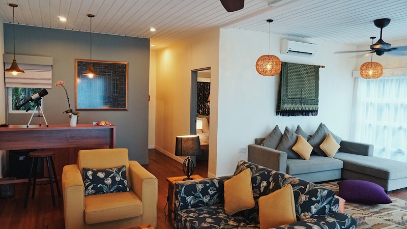 The living room and kitchen of the hillside villa. Photo: Coco Travel