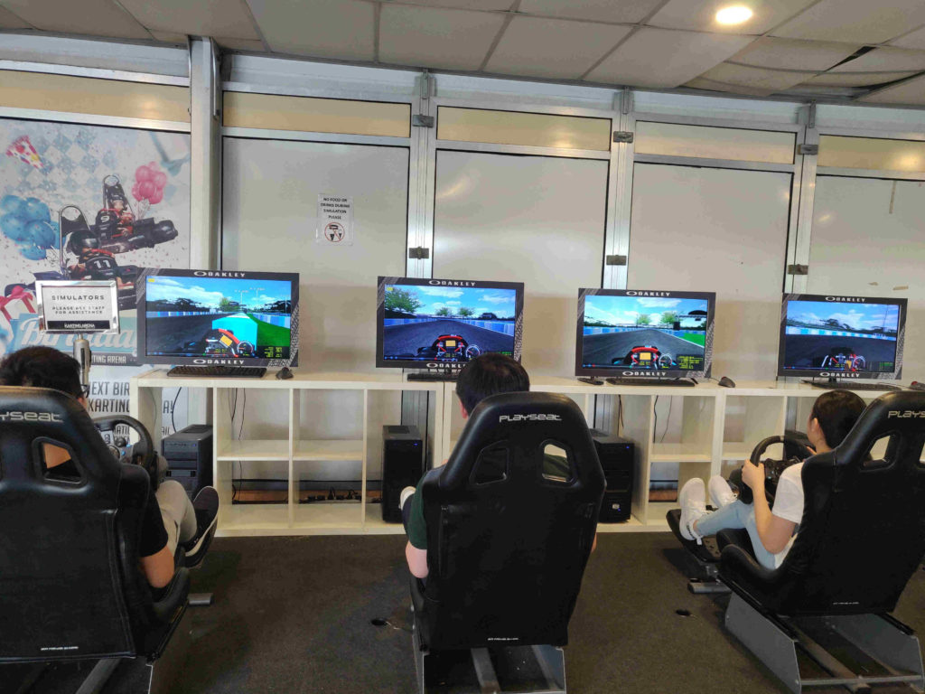 Simulators allow guests to experience the Karting Arena course before heading out. Photo: Nafi Wernsing / Coconuts
