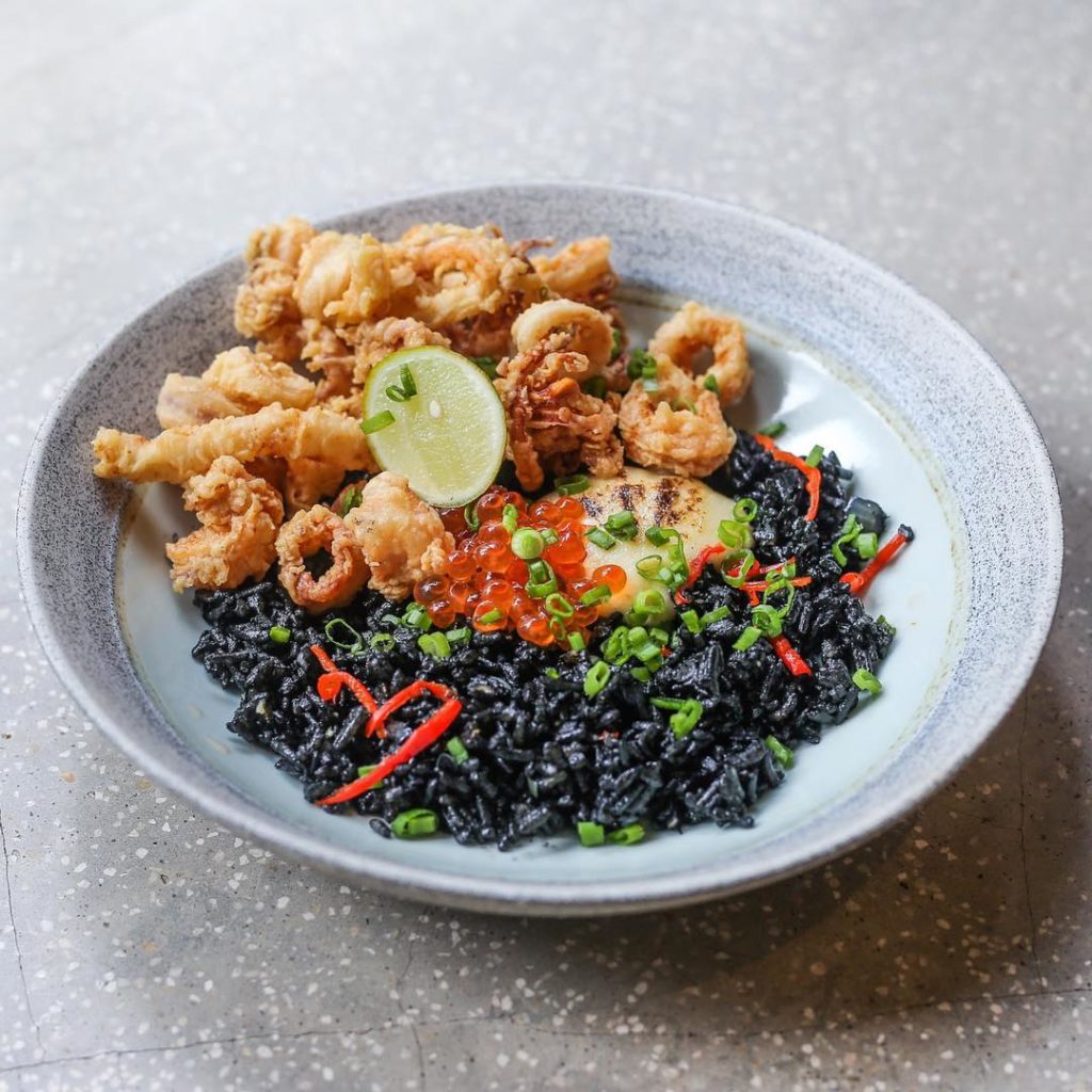 Kilo Kitchen's famous Squid Ink Rice. Photo: Instagram/@kilokitchenjkt