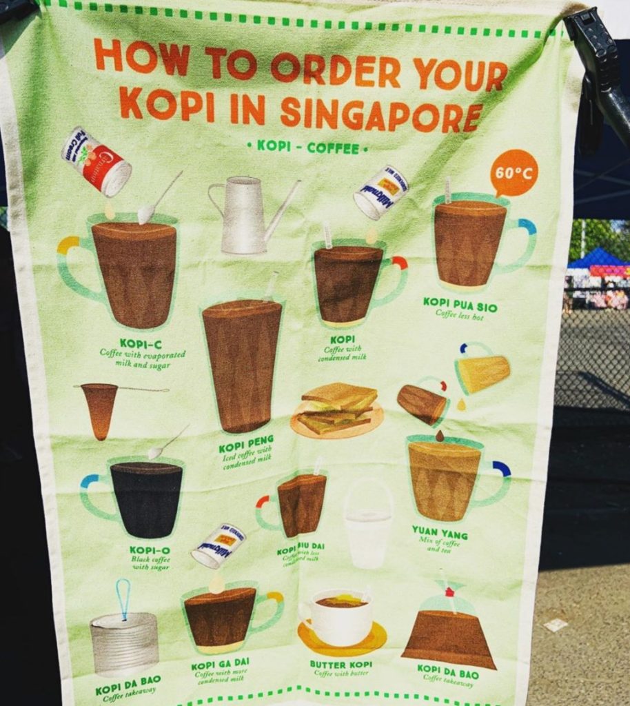 A Singapore-designed hand towel celebrating the country’s kopi culture hangs at the stall. Photo: Lion City Coffee