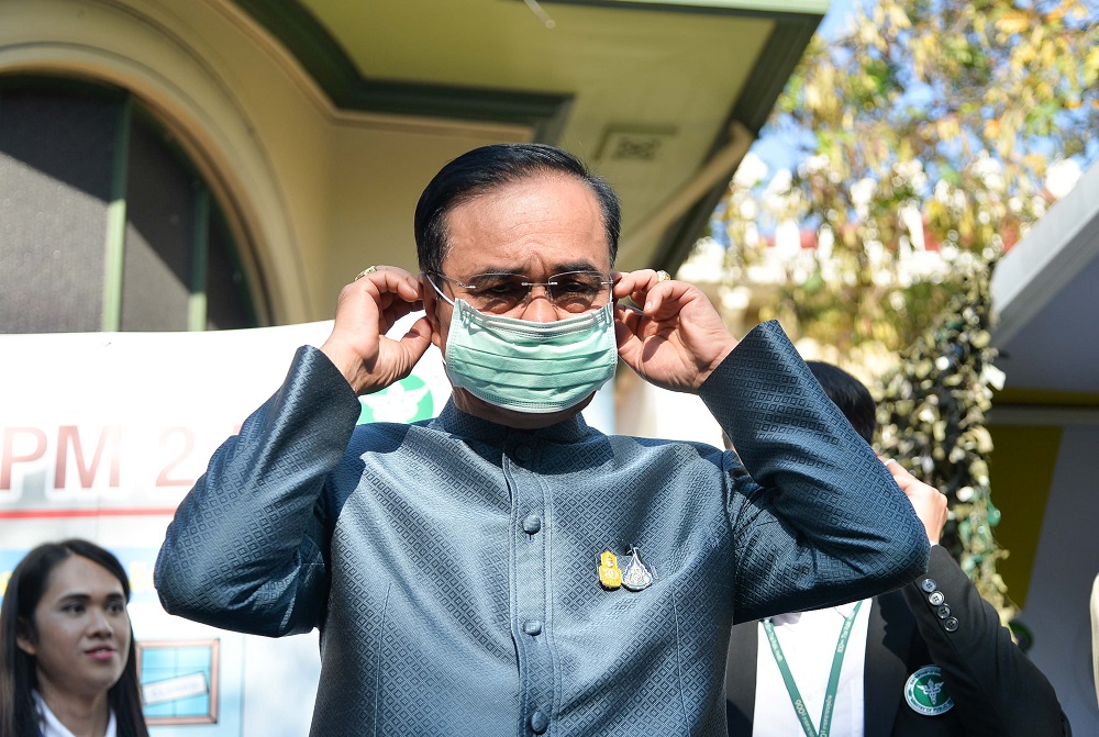 Prime Minister Prayuth Chan-o-cha wears a face mask