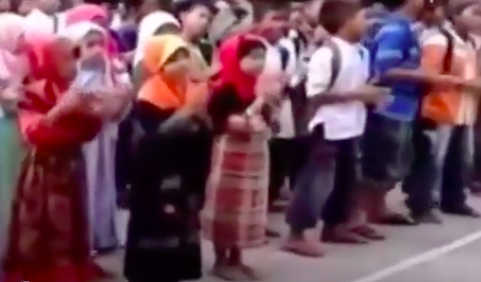 Children taking part in a bigoted chant in Yogyakarta, Indonesia. Photo: Video screengrab from Kumparan