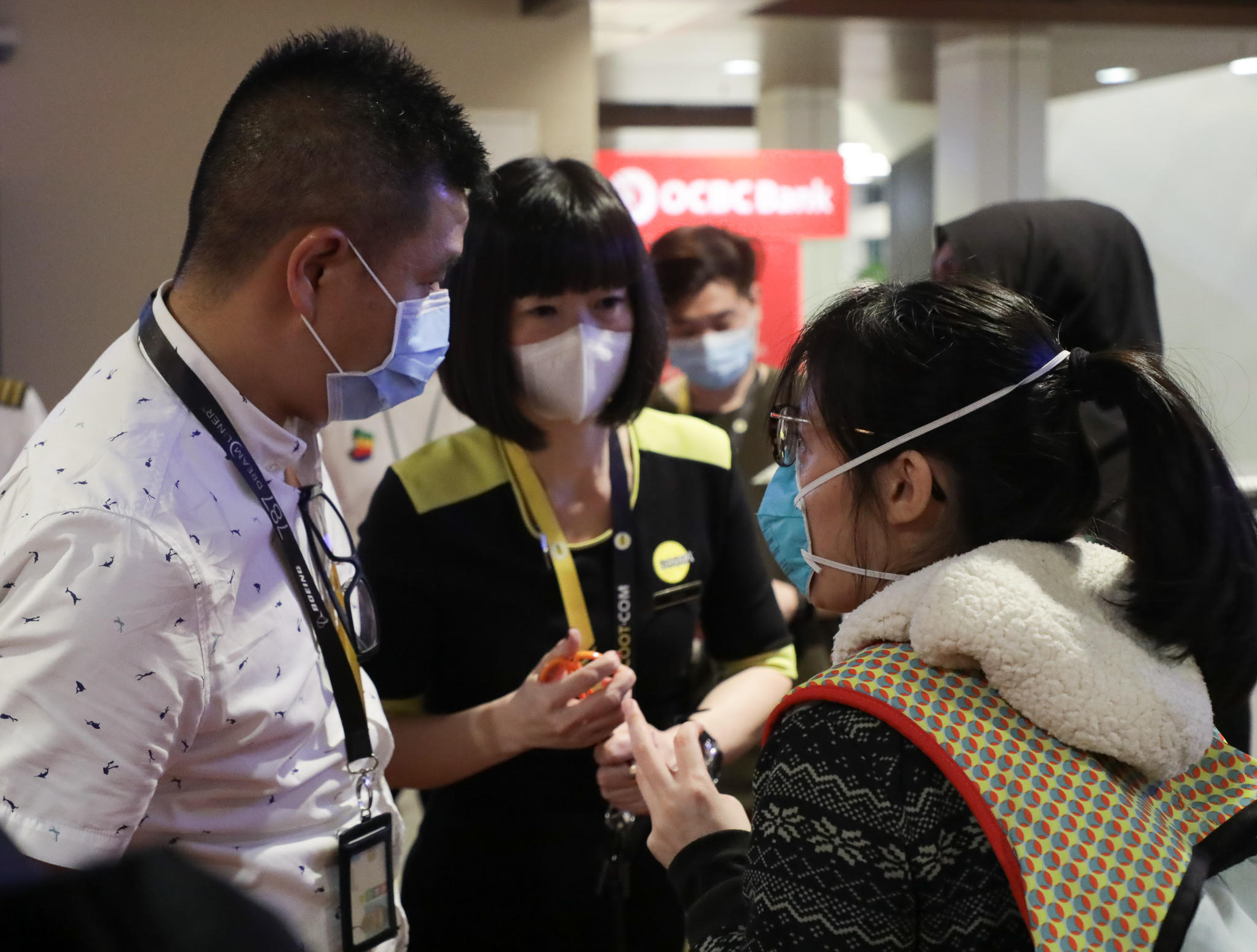 Pre-flight preparations by MFA, MOT, CAAS, airport and airline officers at Changi Airport for flight to Wuhan. Photo: Singapore Foreign Affairs Ministry