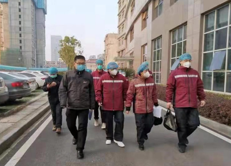 A medical team from Shaanxi, China, arrives at a Wuhan hospital. Photo: Western Health Channel/Weibo