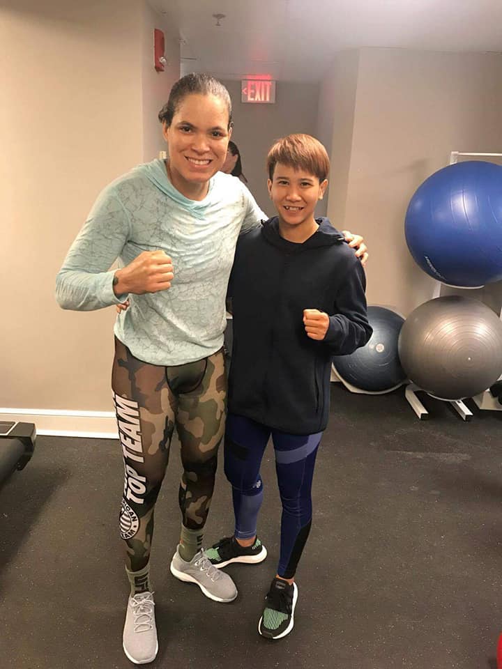 Loma Lookboonmee poses with her idol Amanda Nunes, a Brazilian MMA fighter who became the first two-division female UFC champion. Photo: Loma Lookboonmee / Courtesy