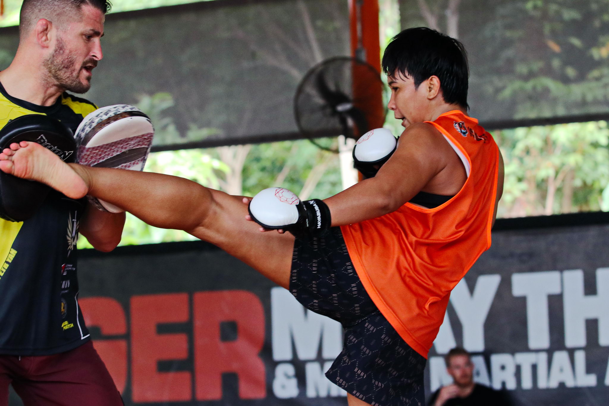 Loma Lookboonmee trains with George Hickman at Tiger Muay Thai training camp. Photo: Hip Santayanon / Courtesy