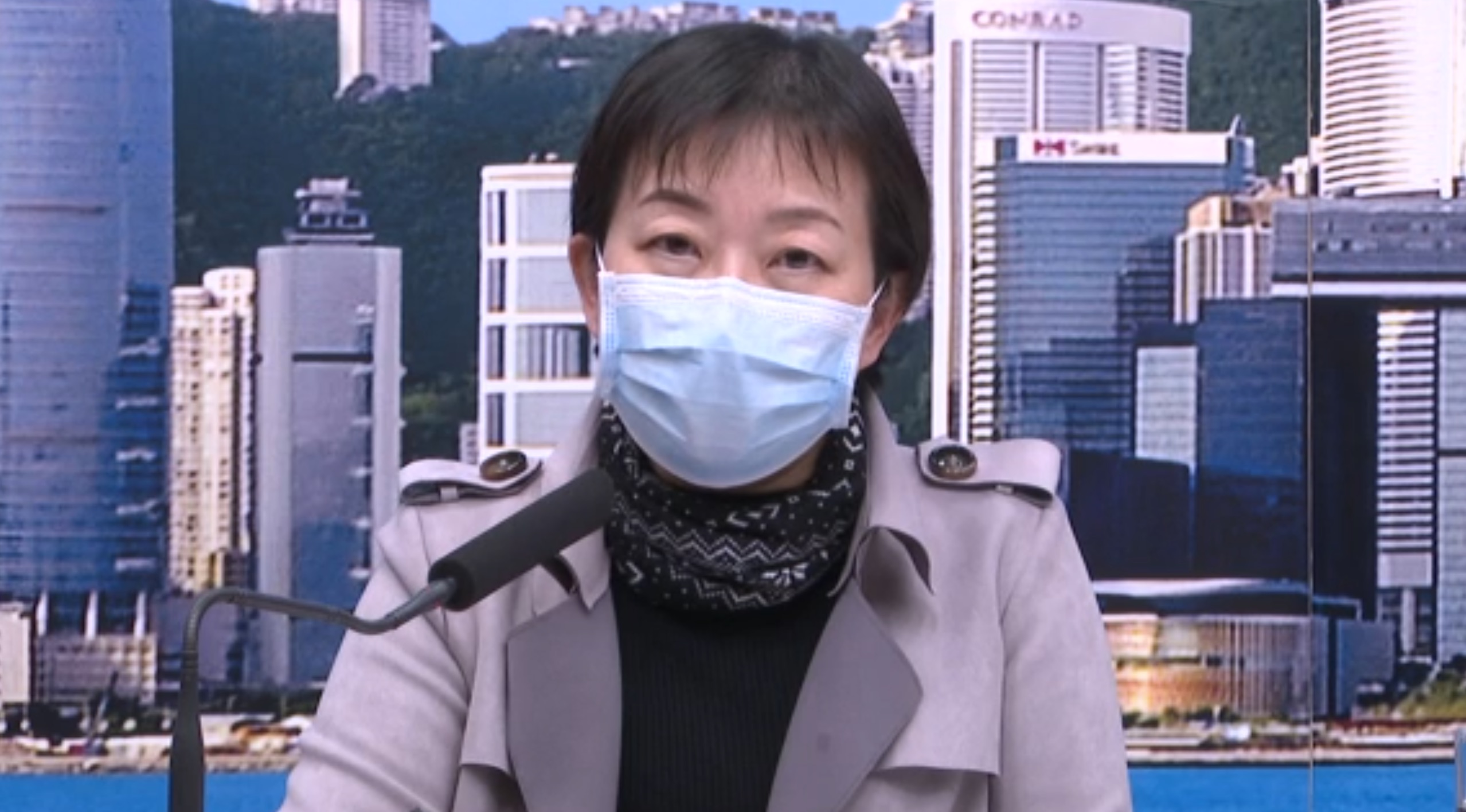 Dr. Chuang Shuk-kwan, head of the Center for Health Protection’s Communicable Disease Branch, speaks to the press about two new coronavirus cases on Thursday. Photo via GovtHK.