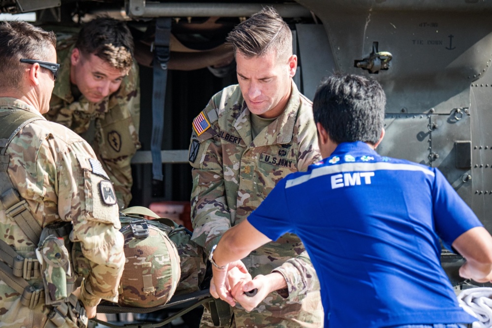 Medical workers from the Bangkok Ratchasima Hospital unload “casualties” on Saturday during a medevac rehearsal with U.S. Army aviators from various regiments. Photo: 1st Lt. Angelo Mejia / U.S. Army

