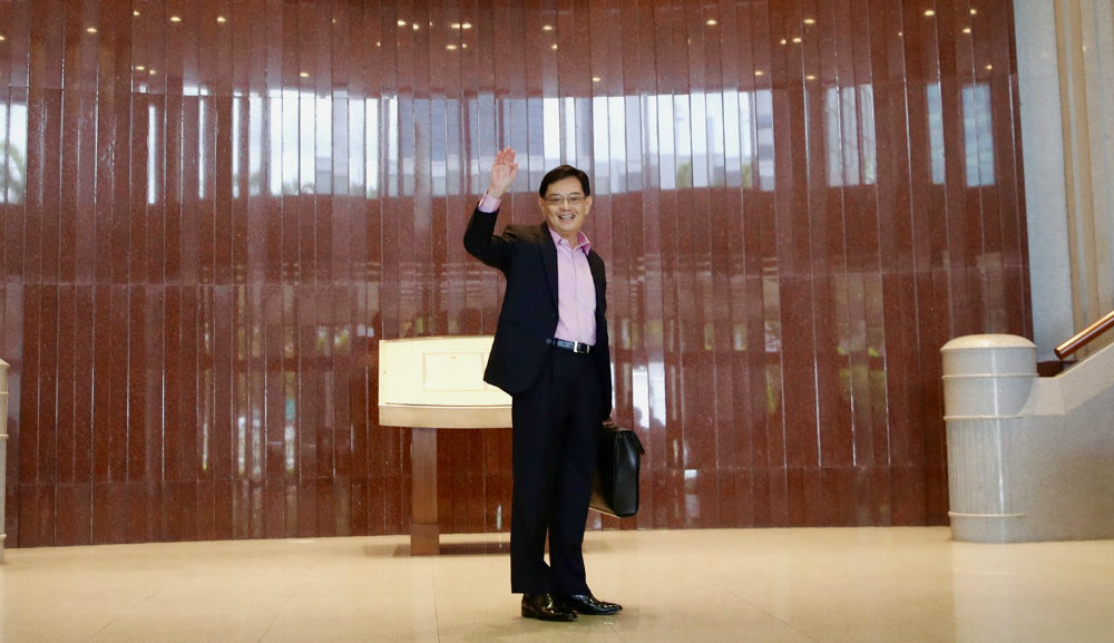 Singapore’s Finance Minister and Deputy Prime Minister Heng Swee Keat waving after arriving at the Parliament House to deliver the 2020 budget statement. Photo: Heng Swee Keat/Facebook