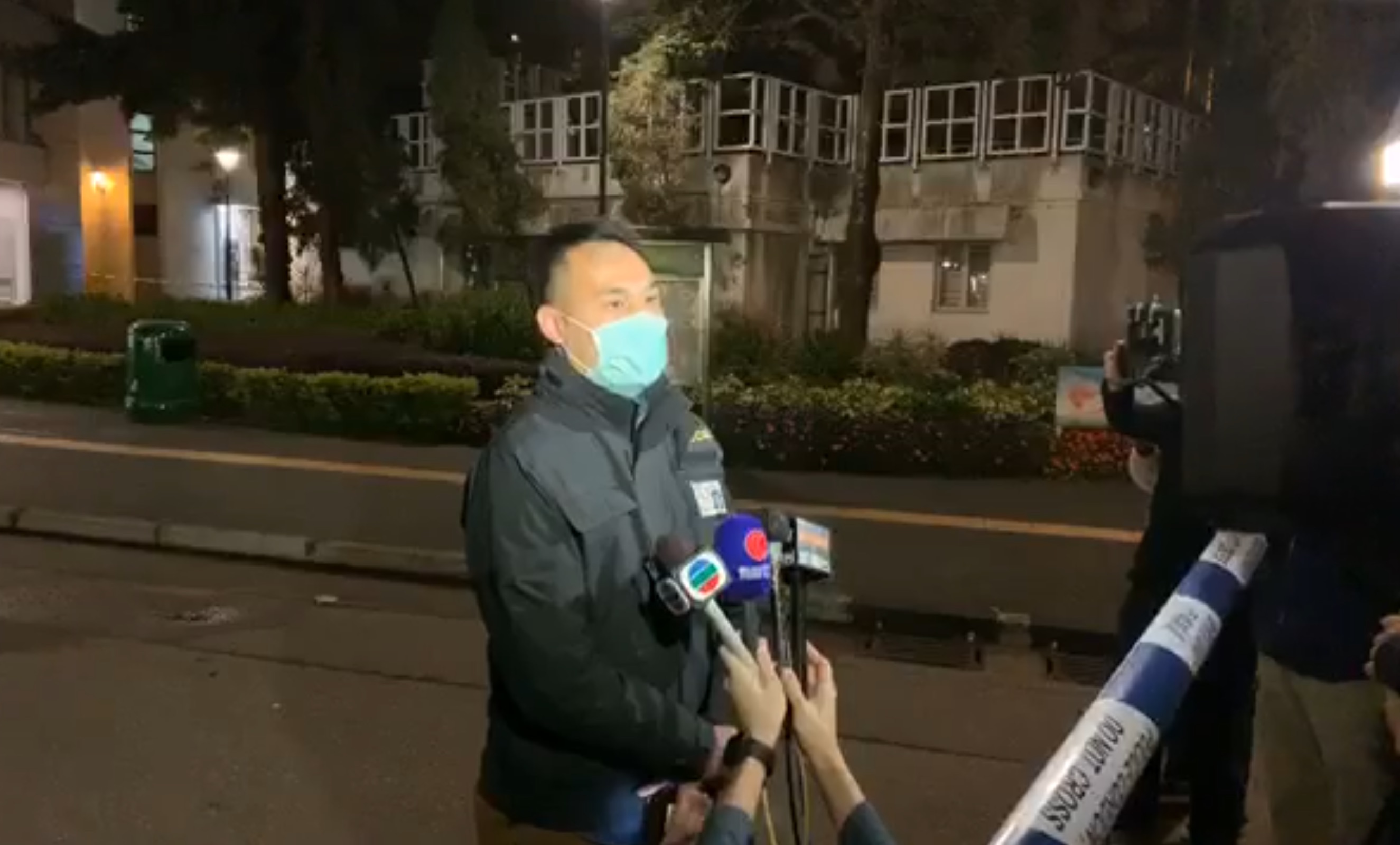 Authorities address the media about a bomb that was detonated in a library bathroom in Lai Chi Kok last night. Screengrab via Facebook.