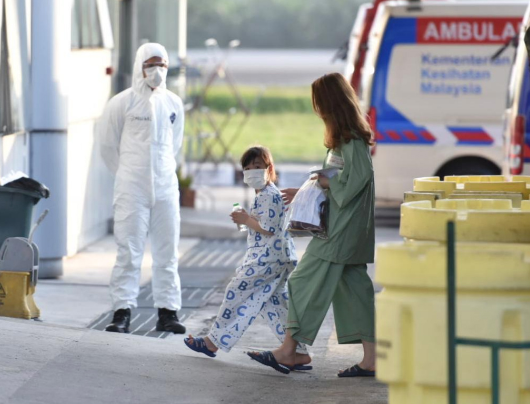 Malaysians go into quarantine Wednesday after being repatriated from Wuhan, China. Photo: @Kkmputrajaya/Twitter