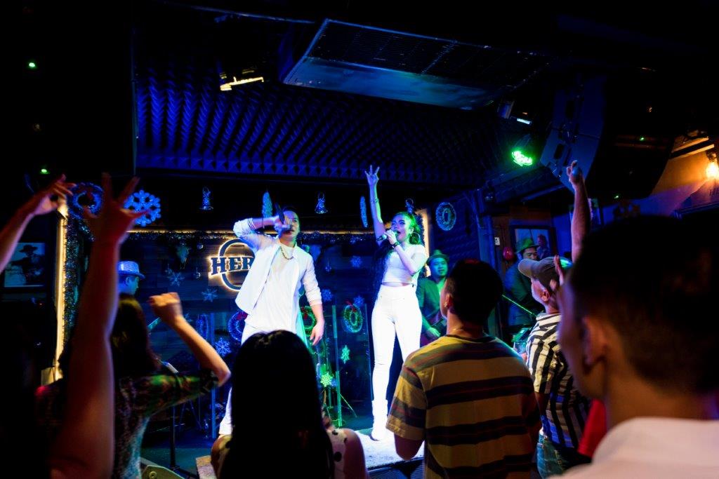 Singers perform at Hero’s bar in Singapore.  Photo: Hero’s/Facebook