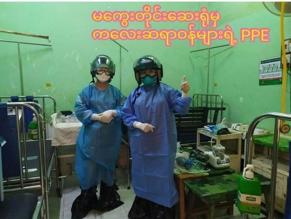 A photo purportedly showing medical personnel wearing makeshift protective gear has been circulating on Facebook. Its authenticity could not be verified.