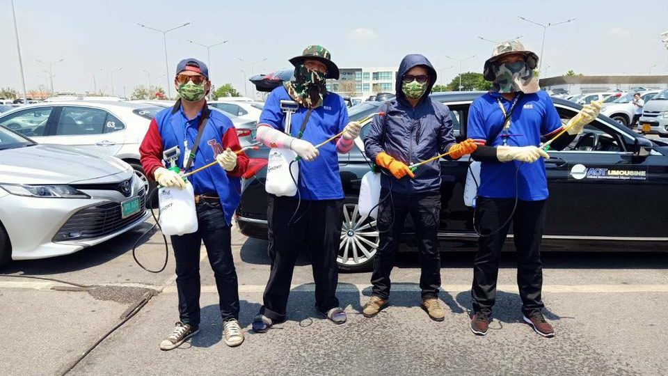 Limousine cleaners pose for the camera in Thailand. Photo: Suvarnabhumi Airport/ Facebook