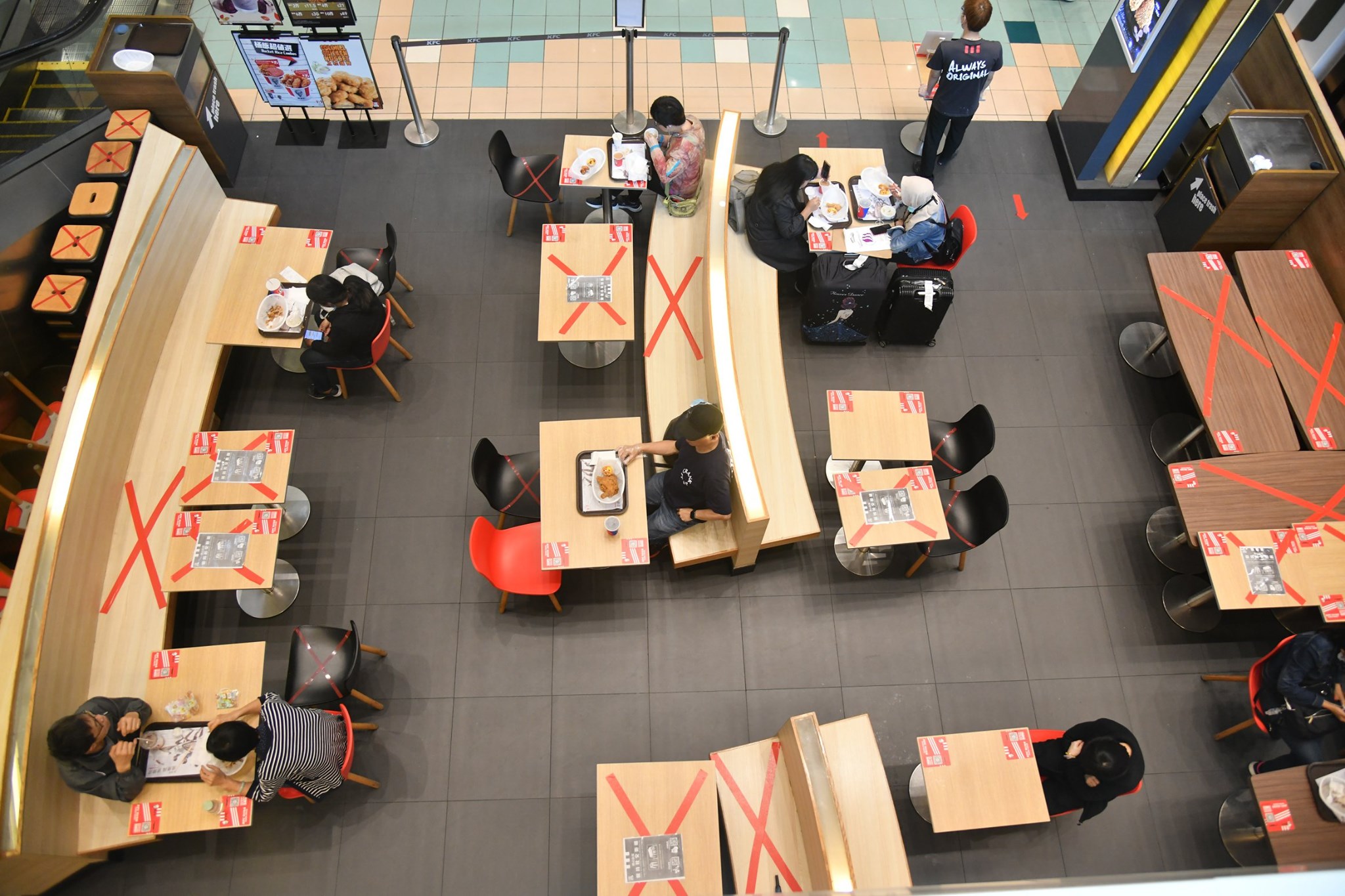A restaurant complying by government restrictions on spacing and seating capacity. Photo: Hong Kong Government