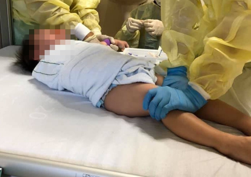 Medical team treating a baby. Photo: Ryanlizana Celine Ng-Chan/Facebook

