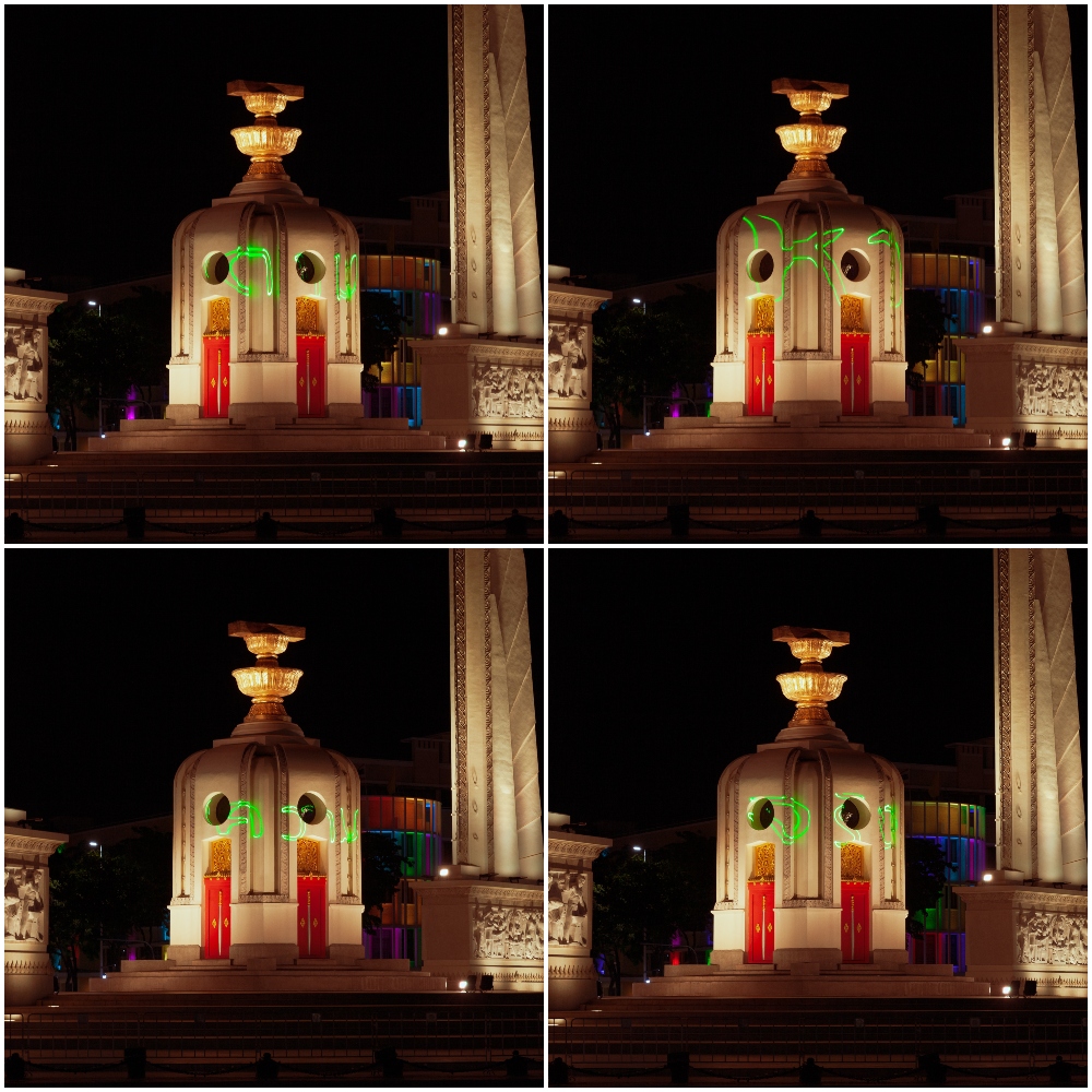 “Seek the truth” read a message projected onto the Democracy Monument. Photos: Vinai Dithajohn / Courtesy