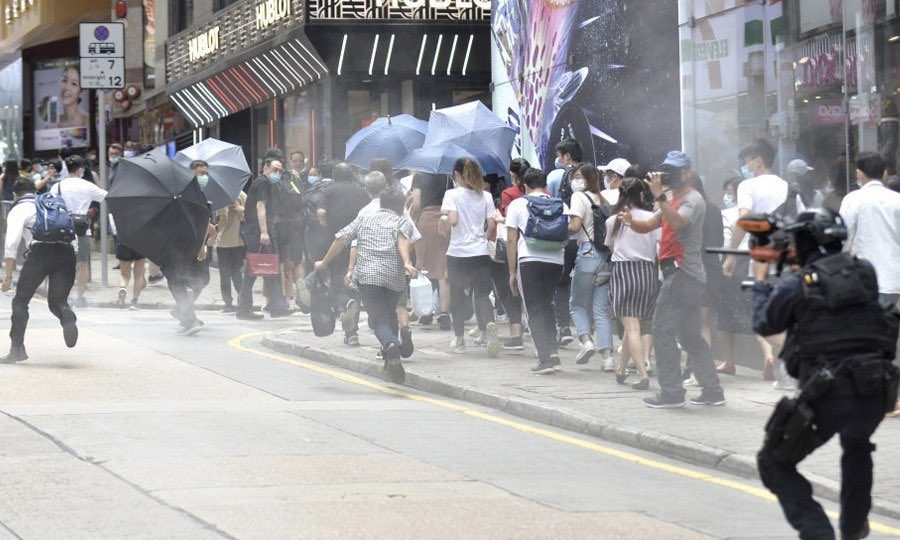 Police fire pepper balls at protesters in Central on May 27, 2020. Photo: Apple Daily