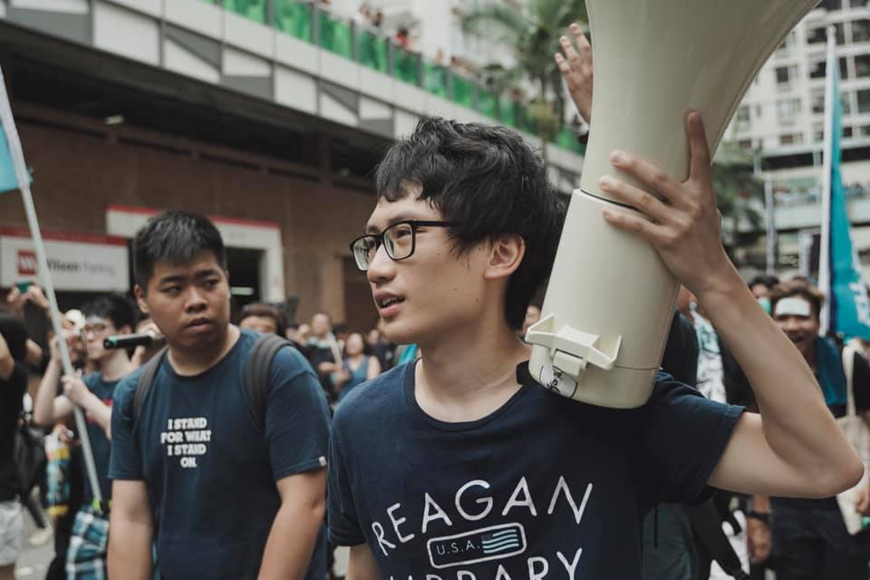 Jeffrey Ngo takes part in an anti-government march in Sha Tin on July 14, 2019.
