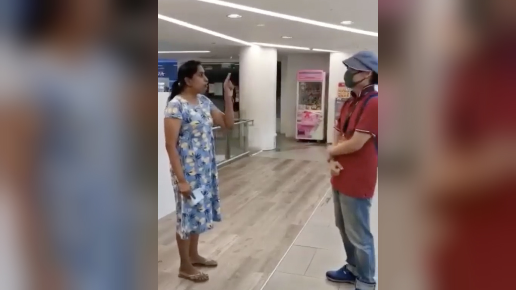 Woman confronts man in shopping mall. Image: All Singapore Stuff/Facebook