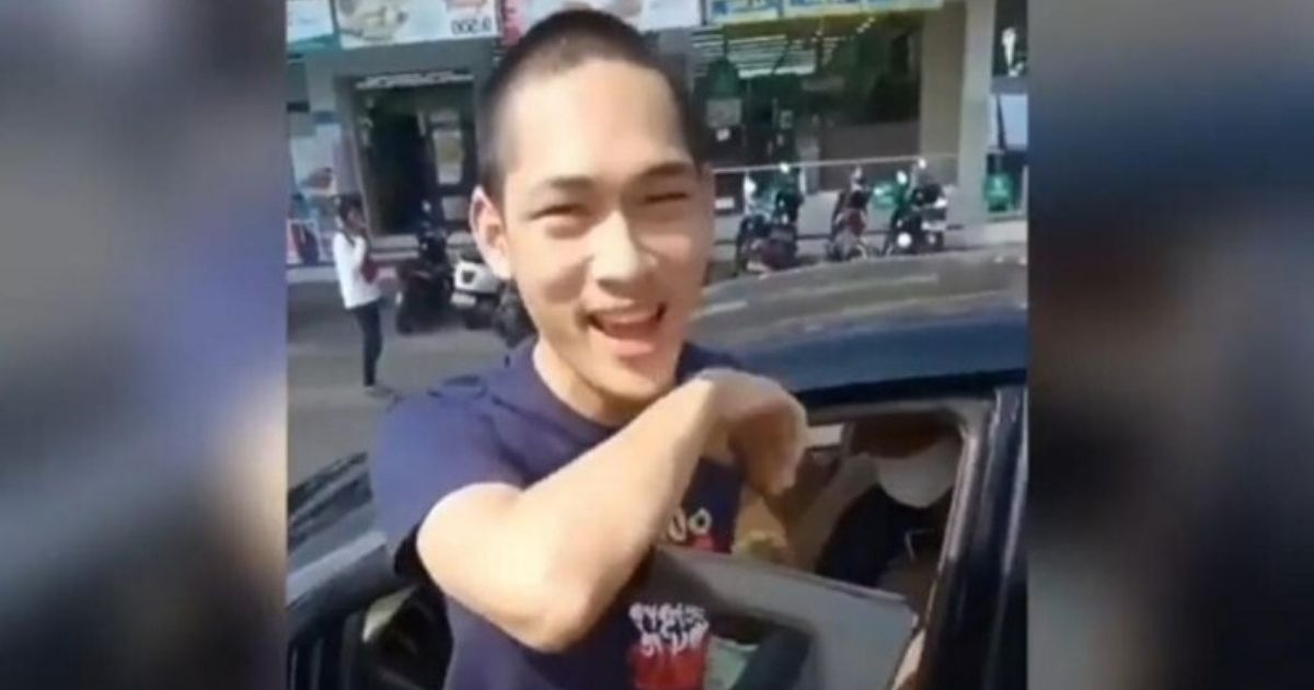 Screenshot of a video showing YouTuber Ferdian Paleka with a smirk saying that he was “more comfortable inside” his cell as he drove away in a car. His lawyer later said that the remark was made in jest.