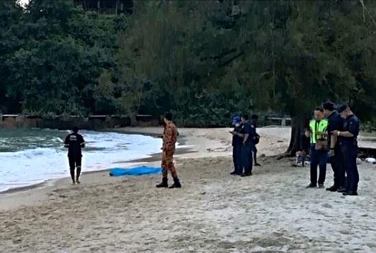 Search and rescue personnel at Teluk Batik beach. Photo: Myra Lamb /YouTube