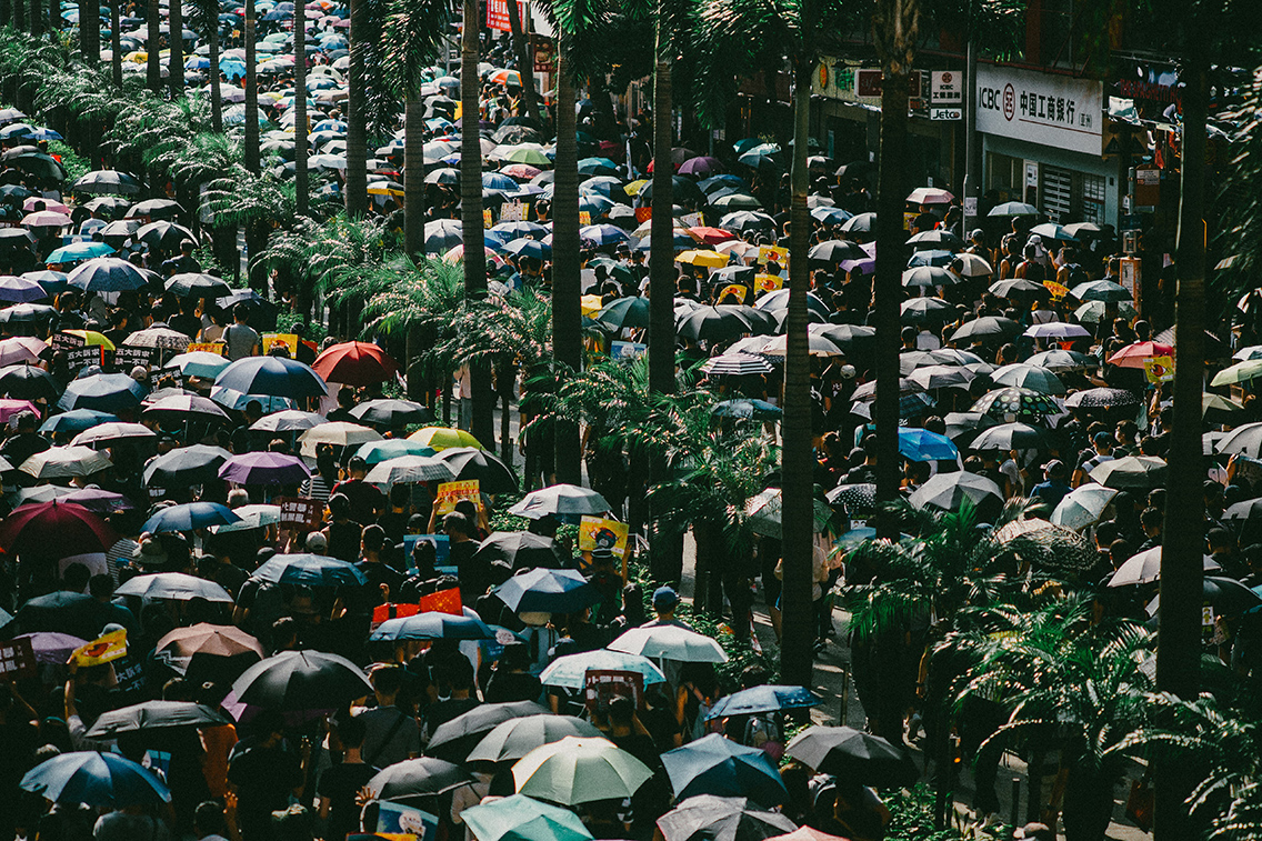 Protesters march against a controversial extradition bill in Hong Kong on May 24, 2019. Photo via Unsplash/Joseph Chan