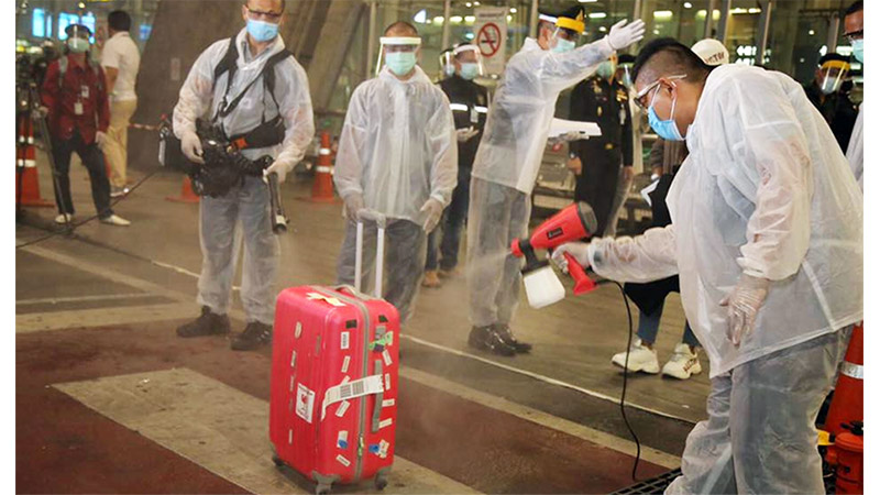 Luggage arriving to Suvarnabhumi Airport from South Korea’s Incheon Airport gets seriously sanitized in an April 14 file photo. Photo: Suvarnabhumi Airport / Facebook