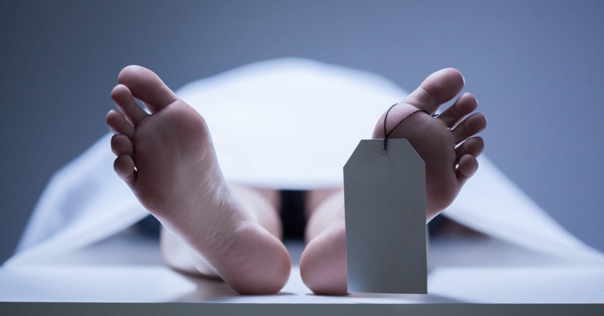Photo illustration of a body in a morgue. Photo: Katarzyna Białasiewicz 
